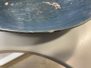 A Chinese monochrome blue Swatow dish with incised carp design, Ming